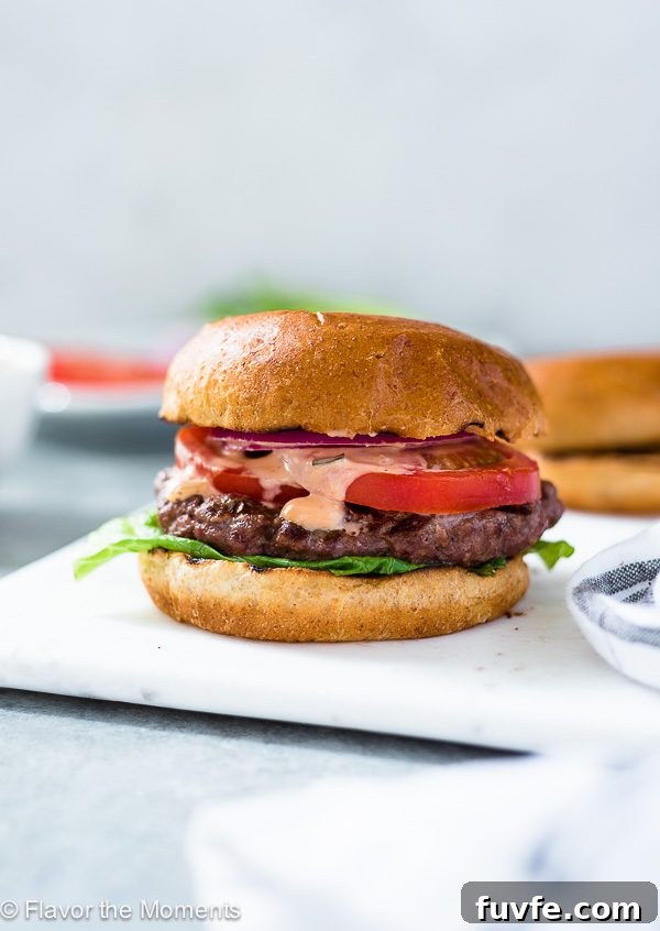 Grilled burger on a white plate
