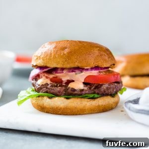How to grill burgers tutorial photo of classic grilled burger on white board