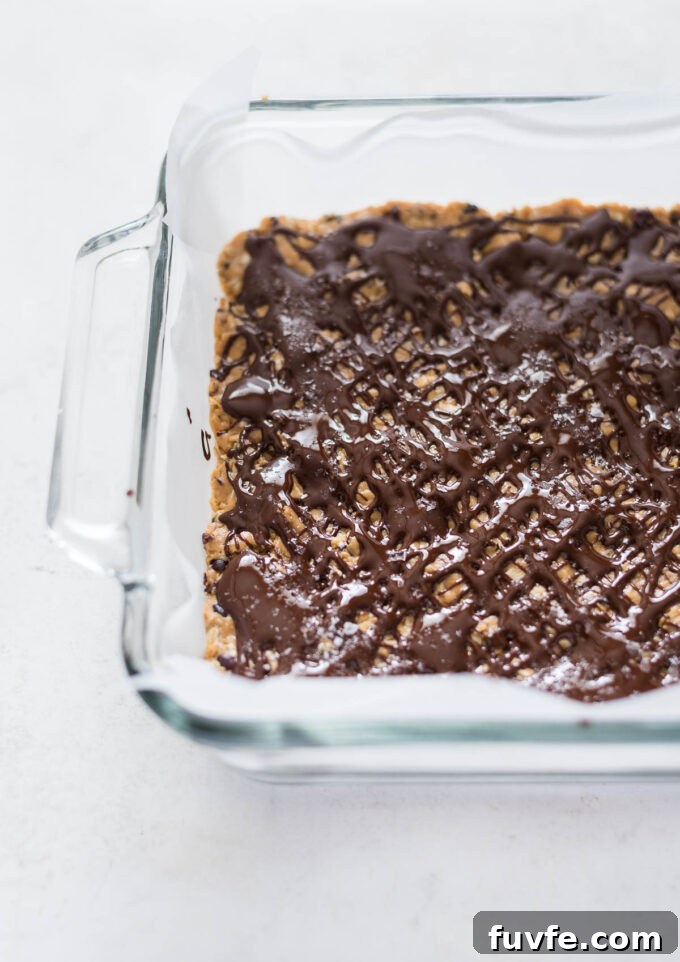 Peanut butter oatmeal no bake bars in a baking dish.