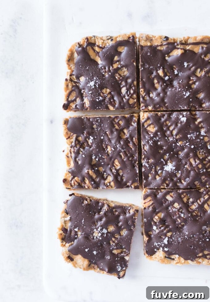 Healthy peanut butter oatmeal bars cut into squares.