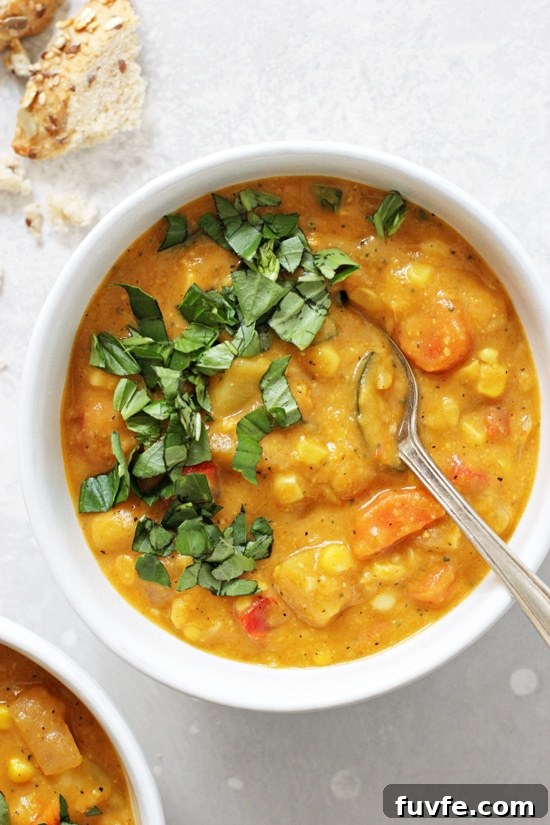 Overhead view of a bowl of dairy free corn chowder.