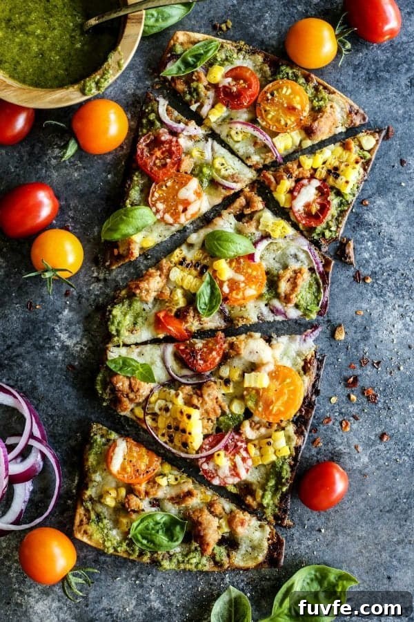 Overhead view of a sliced Farmers Market flatbread.