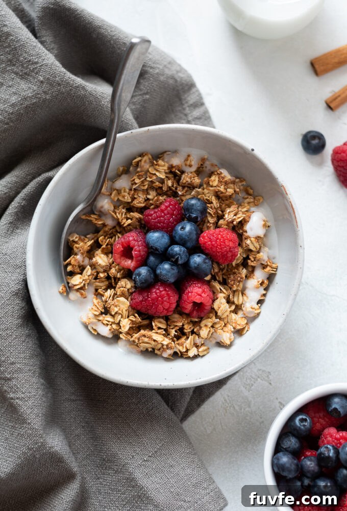 Crunchy Almond Butter Granola Recipe 3 Almond butter granola in a bowl with milk.