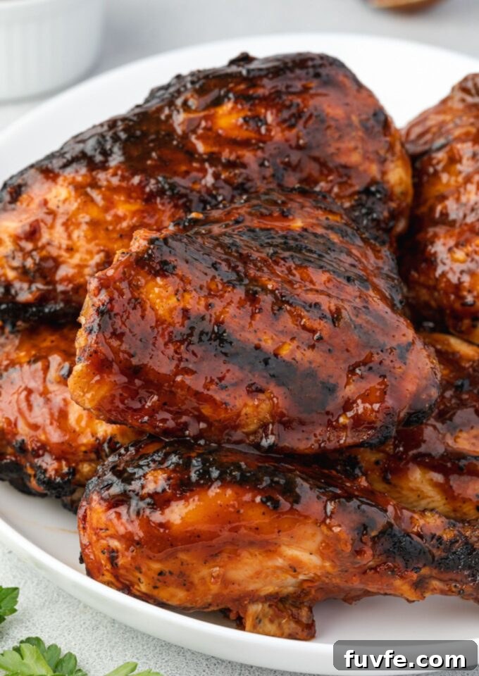 Juicy Smoky Grilled BBQ Chicken Recipe 2 Grilled bbq chicken on a plate