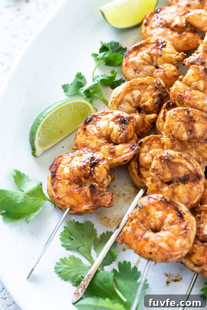 Grilled Chili-Lime Shrimp Skewers Recipe 8 Grilled shrimp on skewers with lime and cilantro
