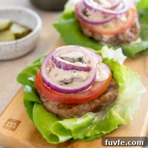 Juicy grilled turkey burgers in lettuce wraps.