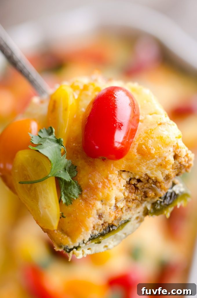25 Poblano Pepper Recipes with Roasting and Storage Tips 13 A slice of poblano egg casserole being held aloft.
