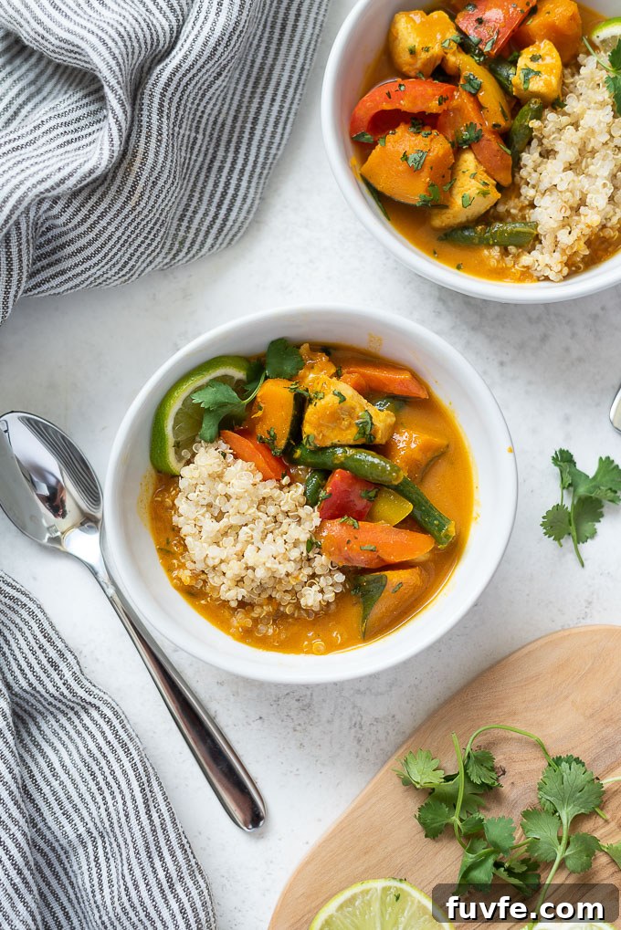 Pumpkin curry in a bowl over quinoa