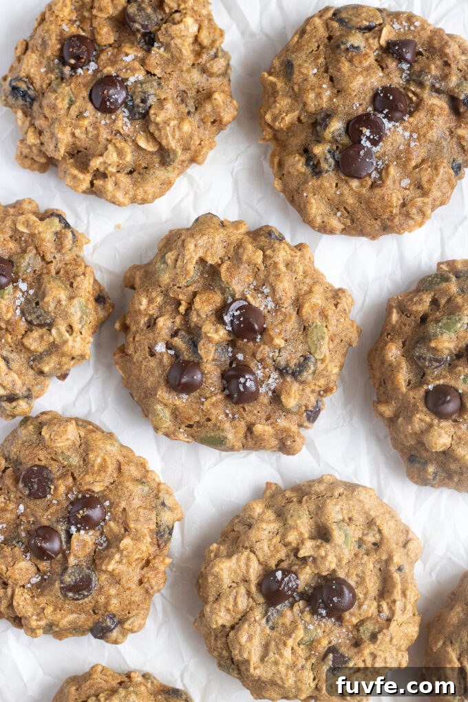 Gluten-free pumpkin breakfast cookies on parchment paper.