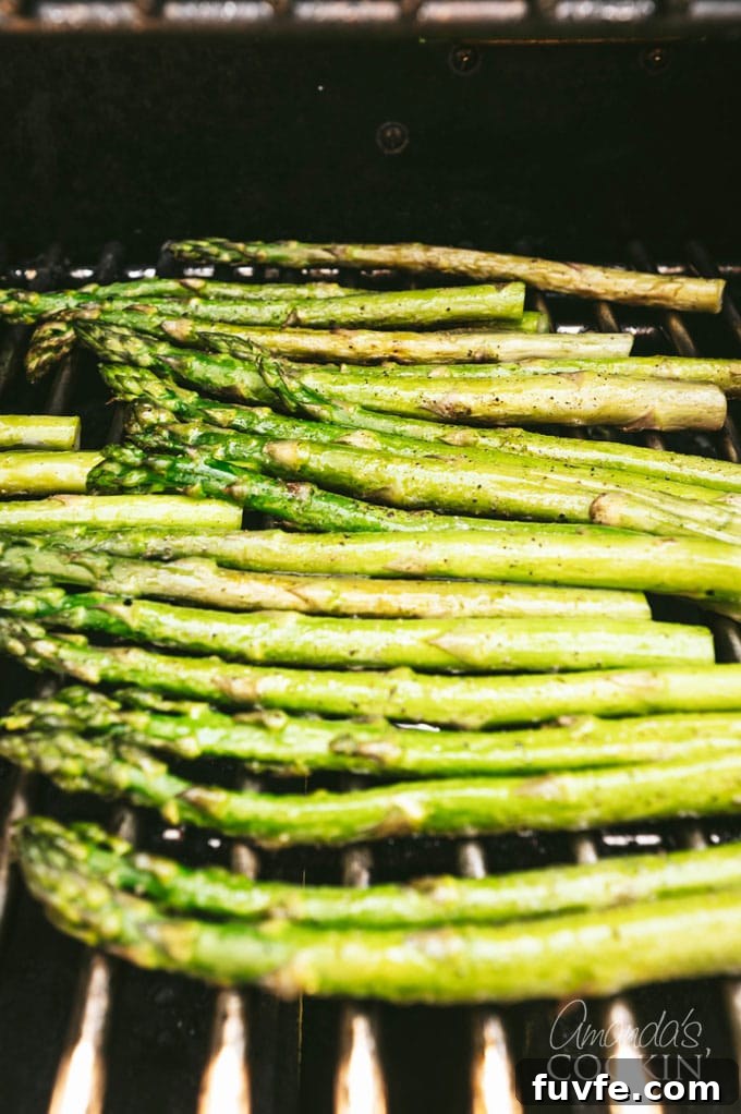 Perfect Grilled Asparagus with Lemon and Garlic 3 asparagus on the grill
