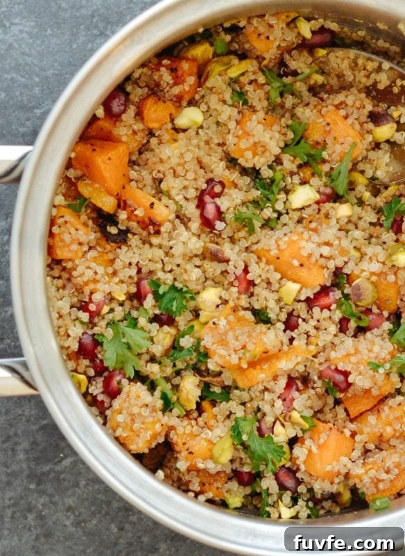 Overhead view of a pot of kabocha squash quinoa salad.