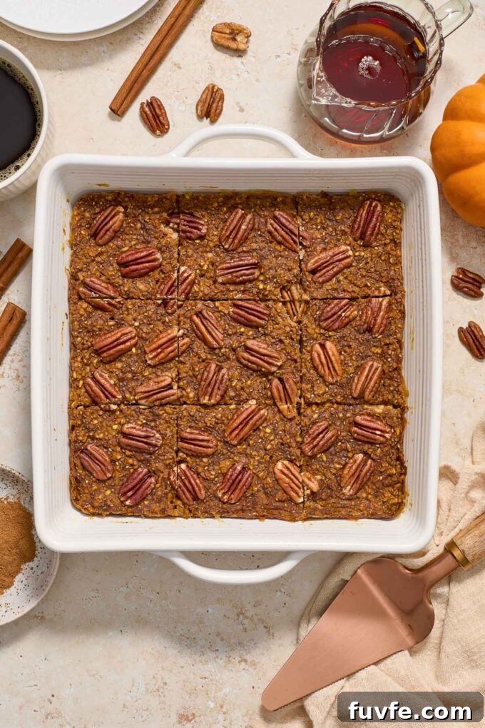 Oven-Baked Pumpkin Steel-Cut Oatmeal Recipe 2 Pumpkin steel cut oat baked oatmeal in baking dish.