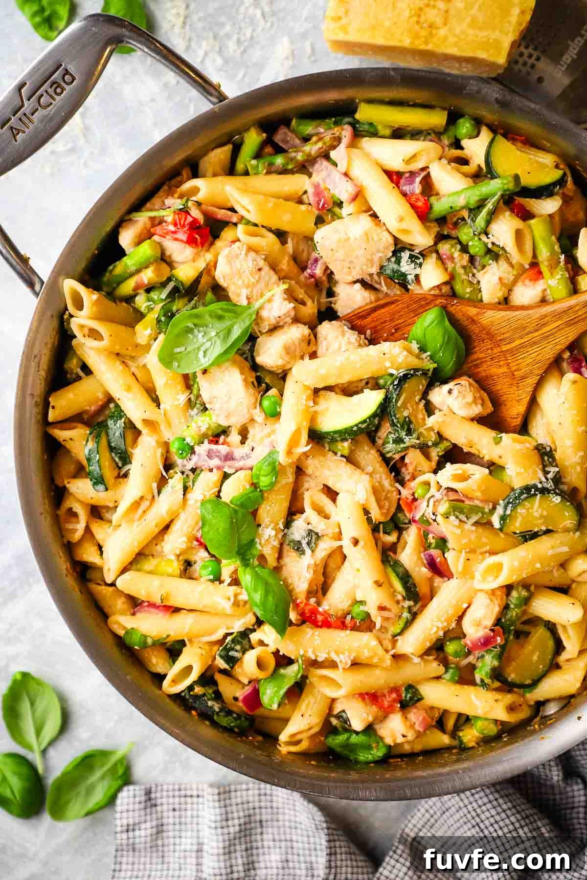 Creamy Chicken Pasta Primavera with Spring Vegetables 3 chicken primavera pasta in a skillet