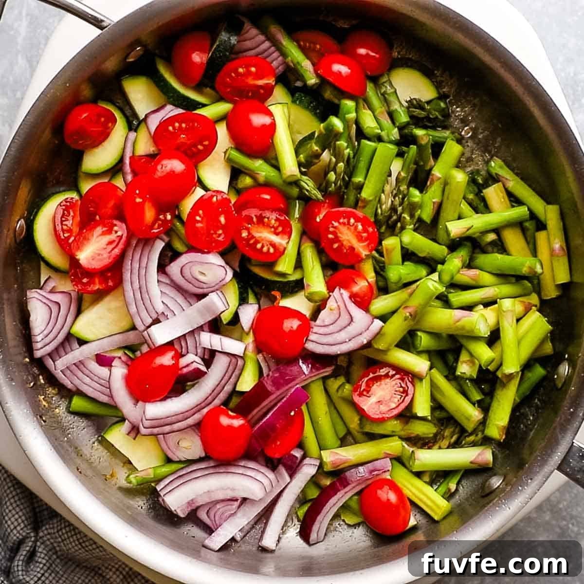 Creamy Chicken Pasta Primavera with Spring Vegetables 7 chopped veggies added to the skillet