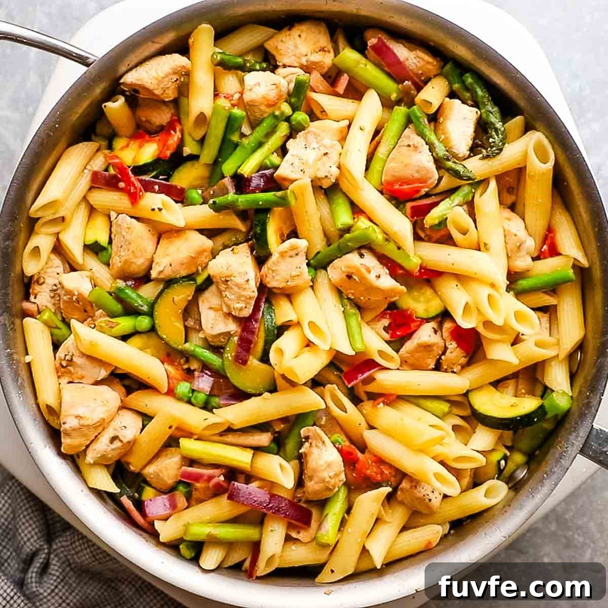 Creamy Chicken Pasta Primavera with Spring Vegetables 10 veggies, chicken, and pasta stirred together