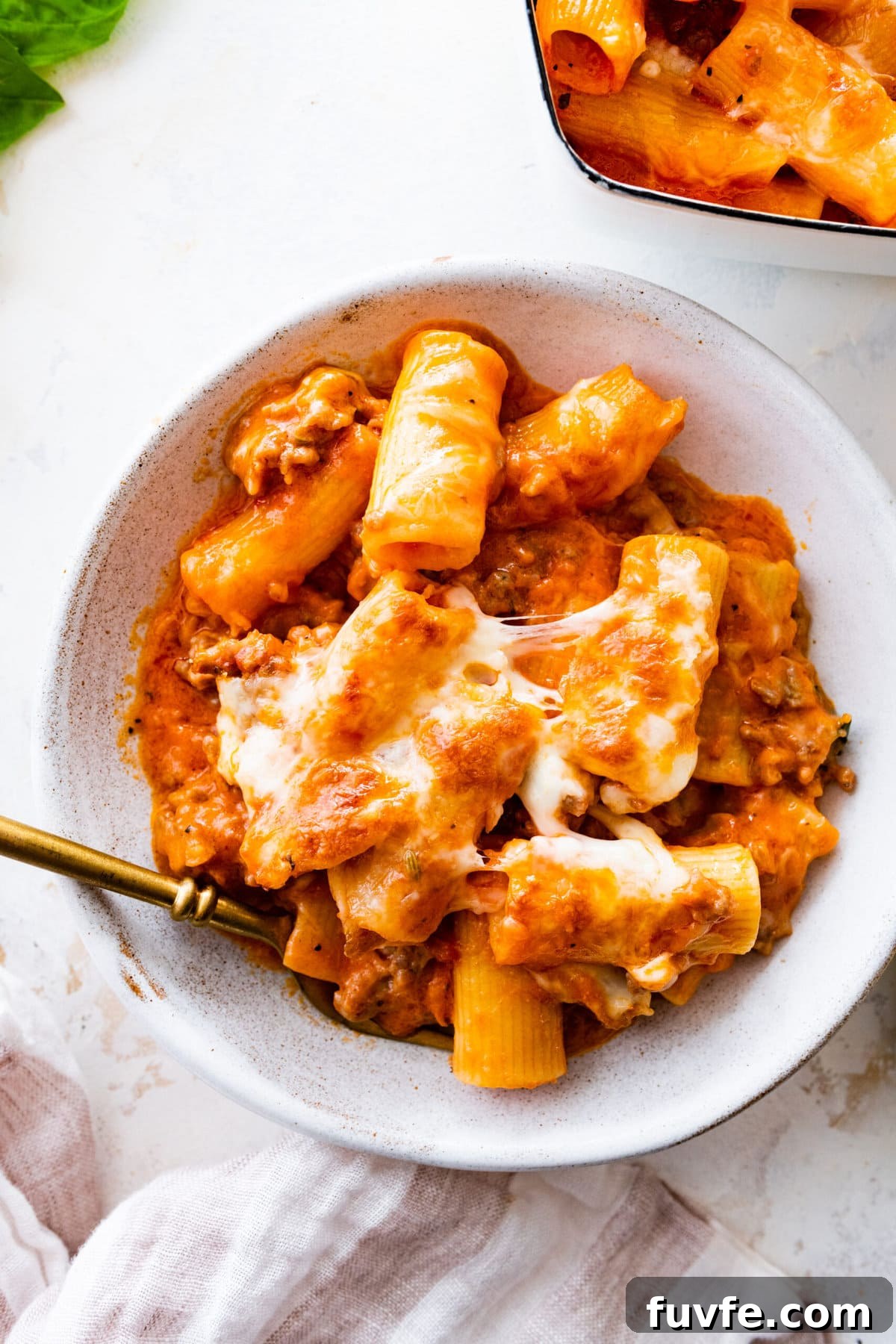 a big bowl of pasta al forno with a fork in it!