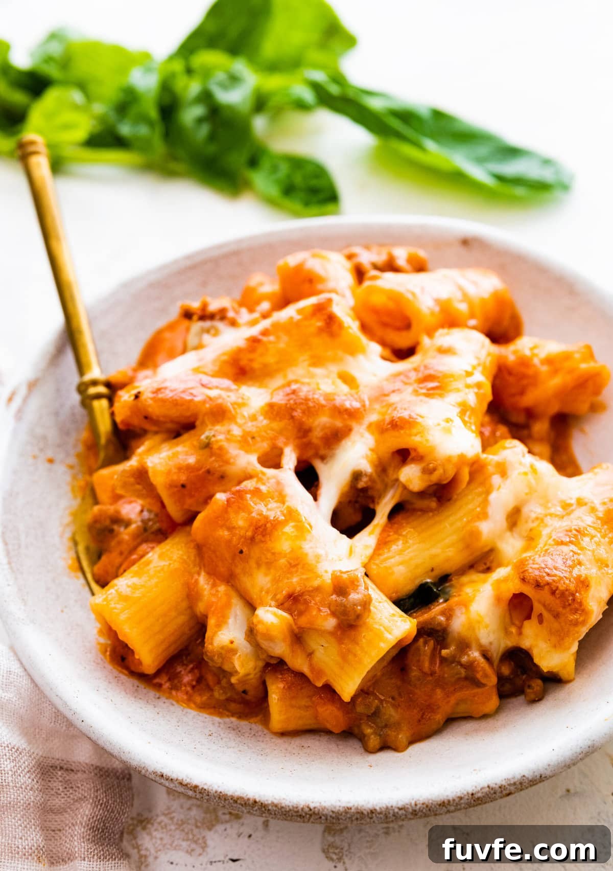 a big bowl of pasta al forno with a fork in it!