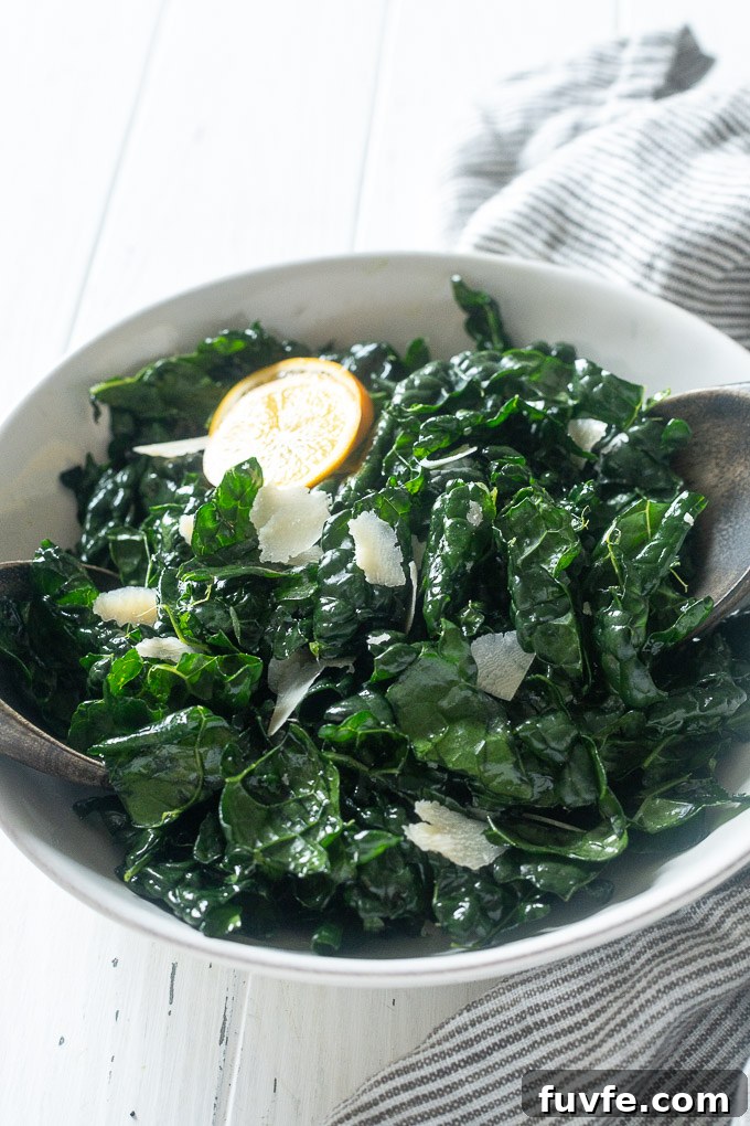 massaged kale with salad servers