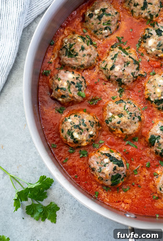 Ground turkey meatballs in skillet with marinara sauce