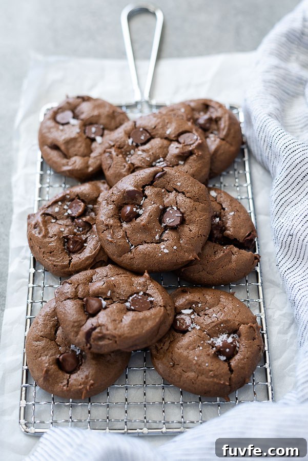 front view of chocolate peanut butter cookies piled on wire rack