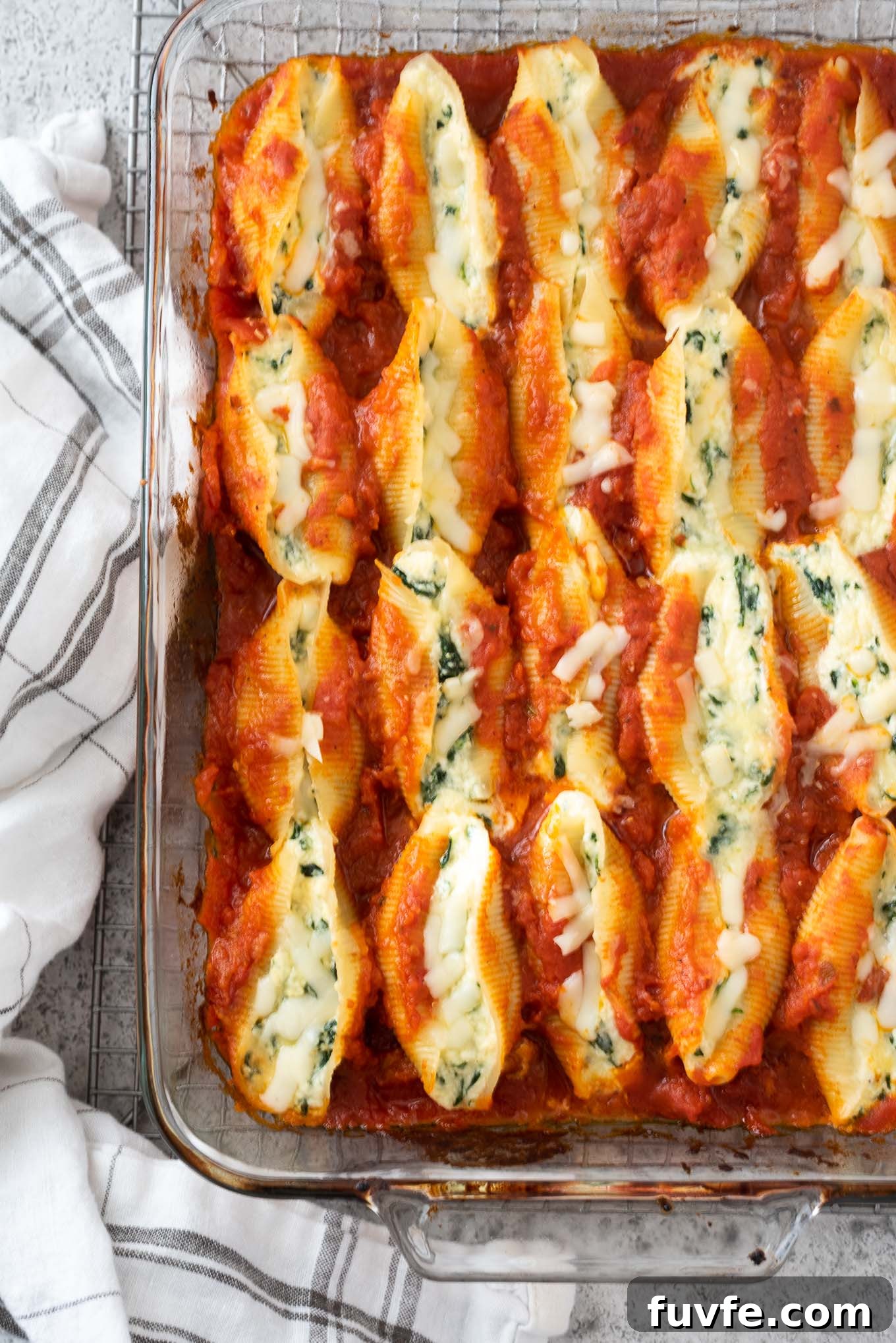 Spinach and ricotta stuffed shells in baking dish