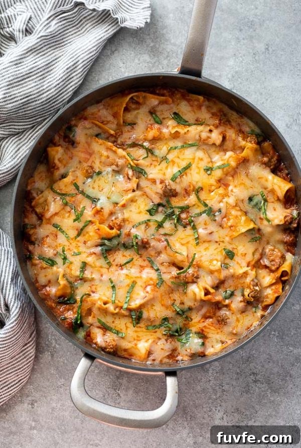 overhead shot of skillet lasagna with chopped basil on top