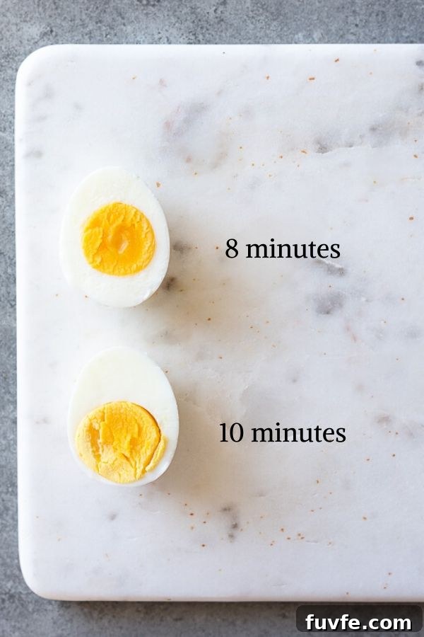How to Make Perfect Hard-Boiled Eggs Every Time 5 hard boiled eggs with cooking times next to them