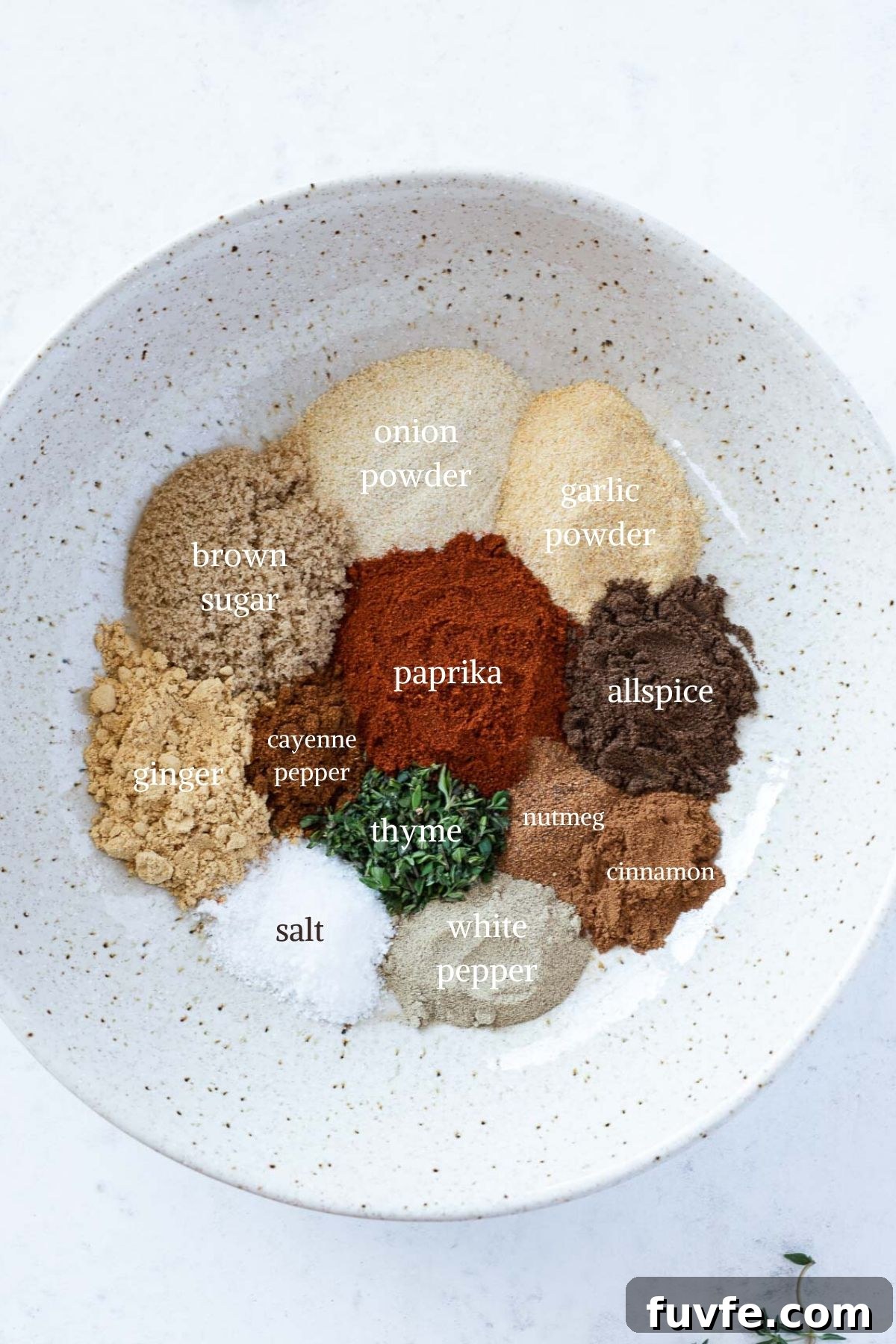 Authentic Jamaican Jerk Seasoning Recipe 3 Homemade jerk seasoning ingredients in white bowl