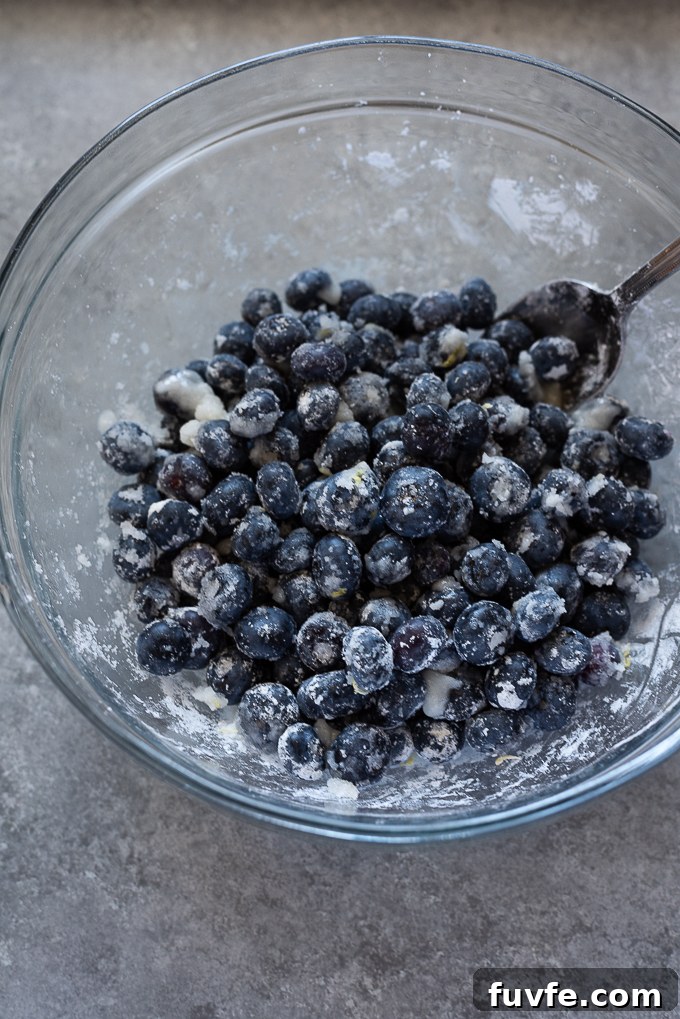 Blueberry filling for blueberry galette in mixing bowl.