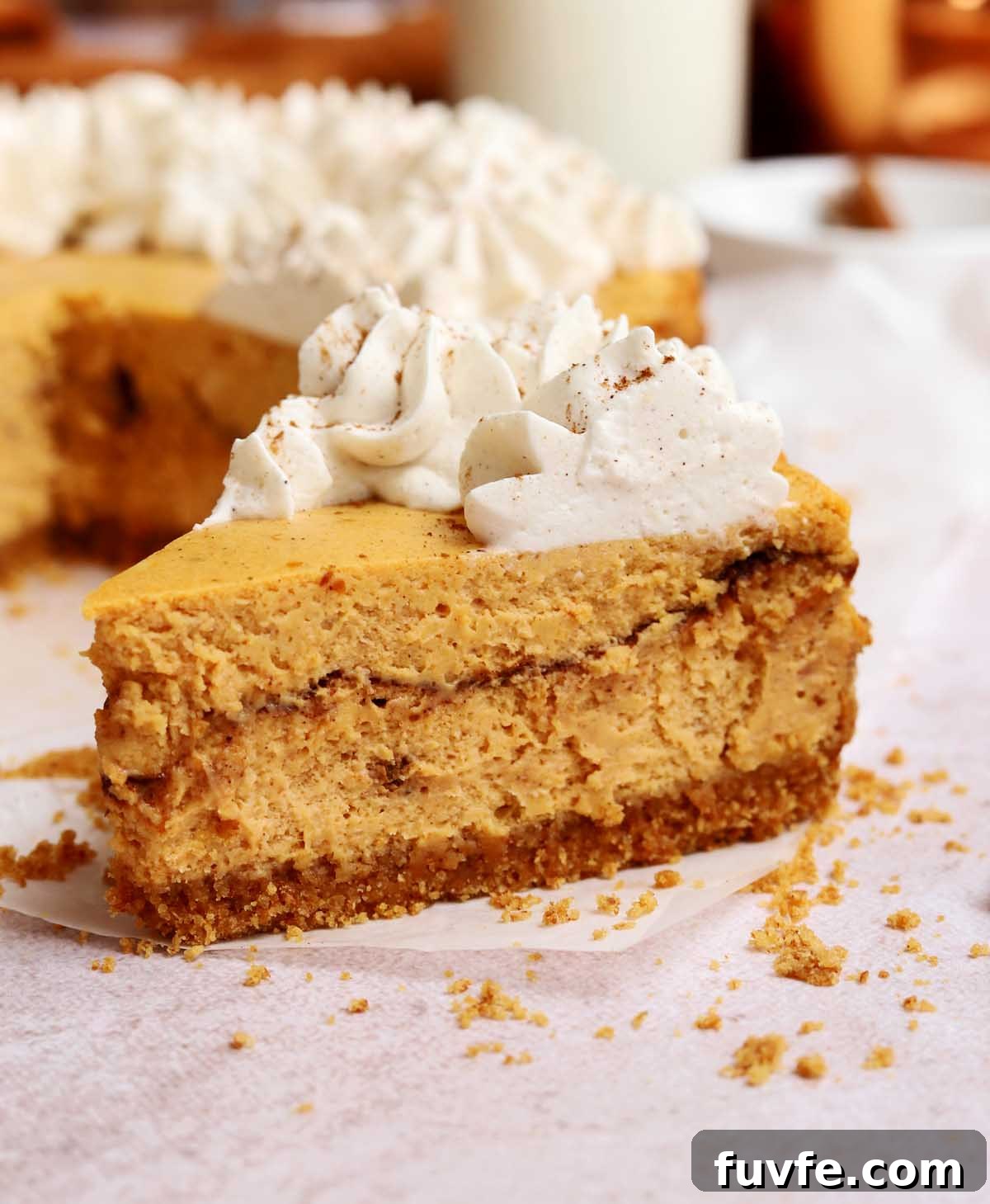 slice of cinnamon swirl pumpkin cheesecake