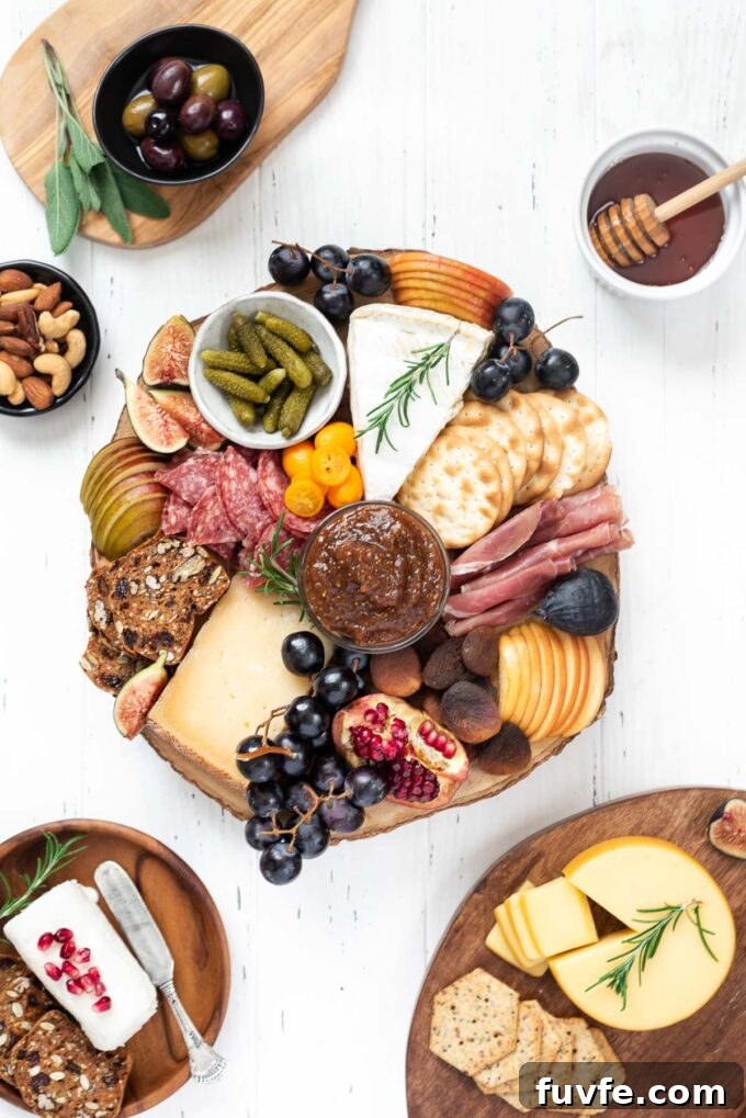 Fall charcuterie board with seasonal fruits, jam, and more.