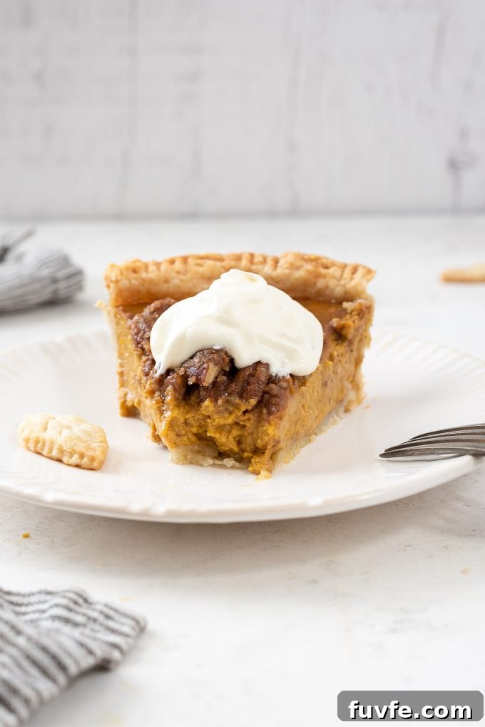 Pumpkin pecan pie close up with bite taken out