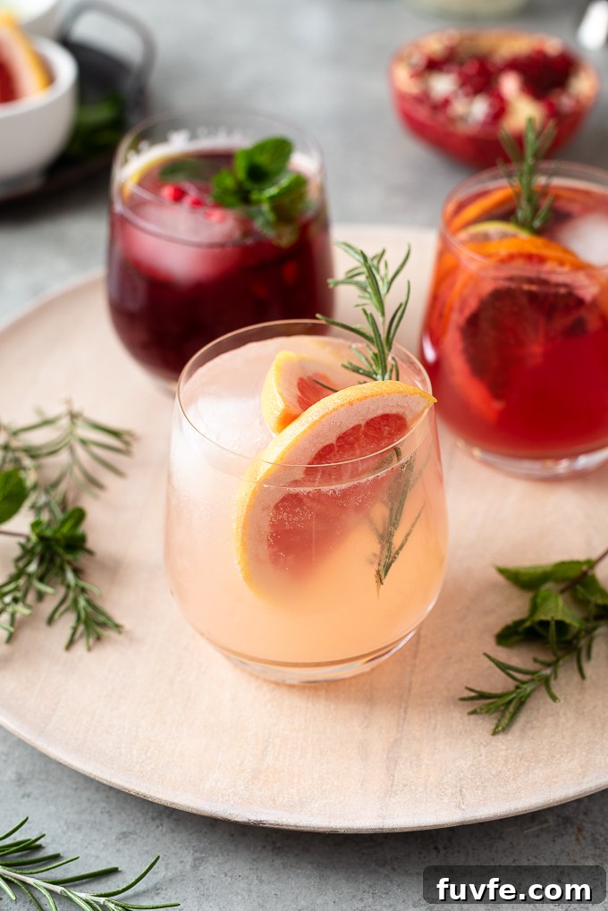 Grapefruit rosemary spritzer with rosemary sprig garnish