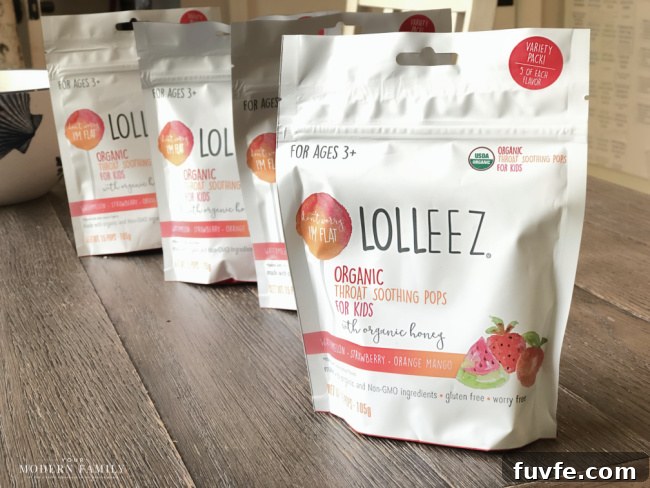 Bags of Lolleez lollipops sitting on a table.