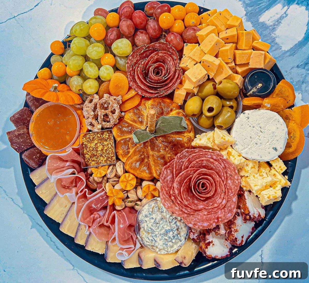 27 Gorgeous Thanksgiving Charcuterie Board Ideas for Entertaining 12 10. Charcuterie Roses and Plenty of Orange