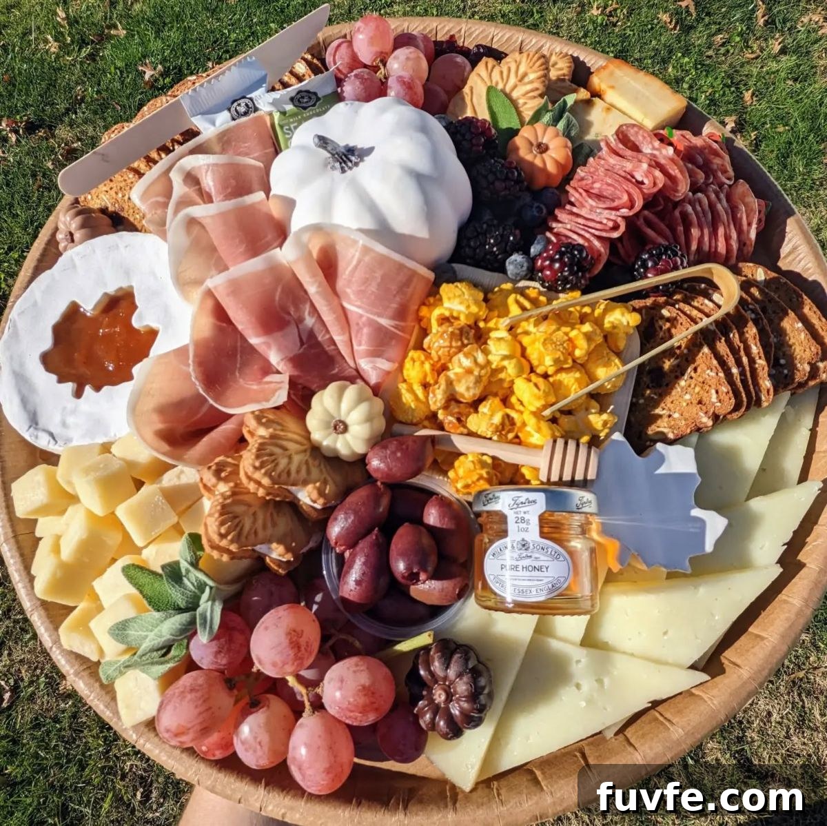 27 Gorgeous Thanksgiving Charcuterie Board Ideas for Entertaining 29 27. Pumpkin Butter Leaf Cut-Out