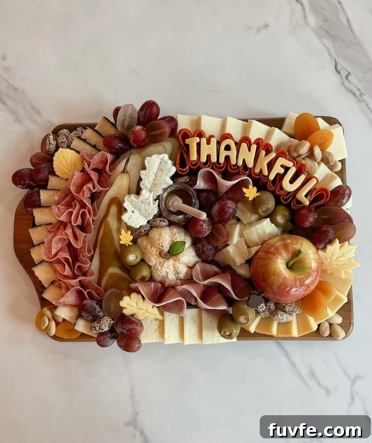 27 Gorgeous Thanksgiving Charcuterie Board Ideas for Entertaining 4 2. Thankful Charcuterie Board