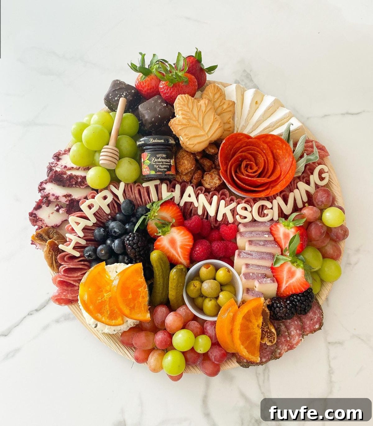 27 Gorgeous Thanksgiving Charcuterie Board Ideas for Entertaining 9 7. Beautiful and Leafy