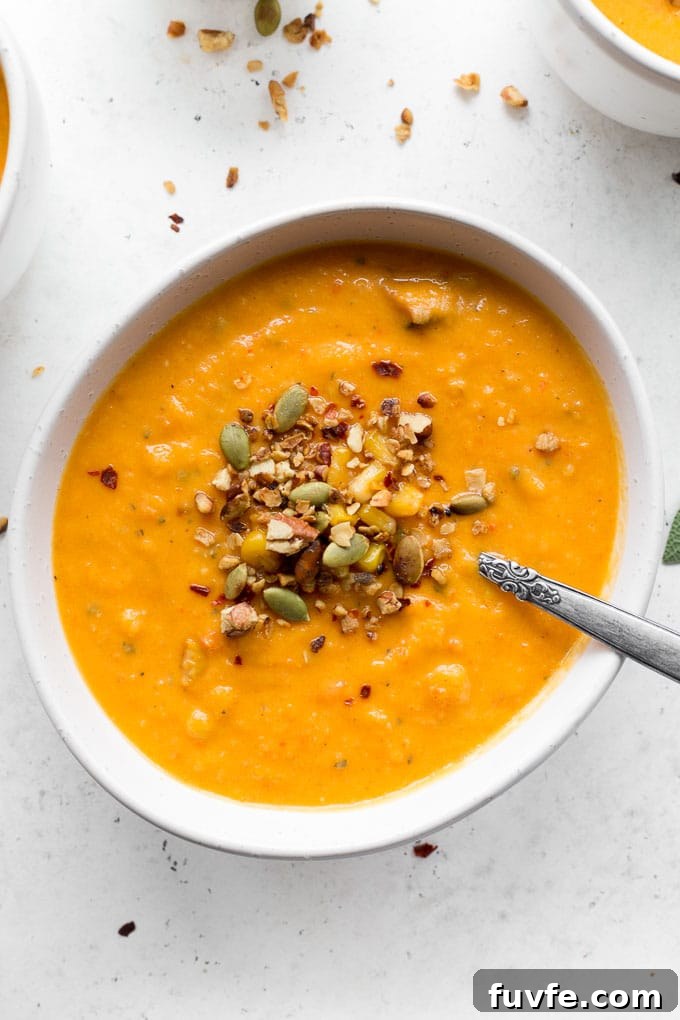Roasted red pepper soup with seeds on top
