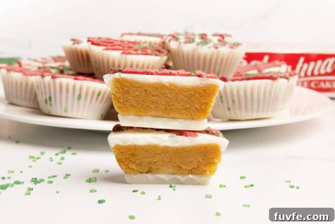Yellow cake bite in a mini muffin tin that does not require dipping. Decorated as Little Debbie Christmas tree cake