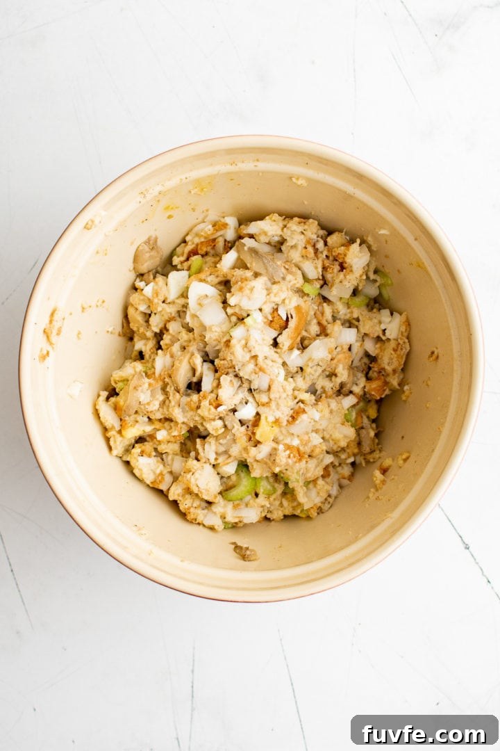 Savory Sage Stuffing Recipe for Thanksgiving and Roast Dinners 6 Stuffing mix in a bowl.
