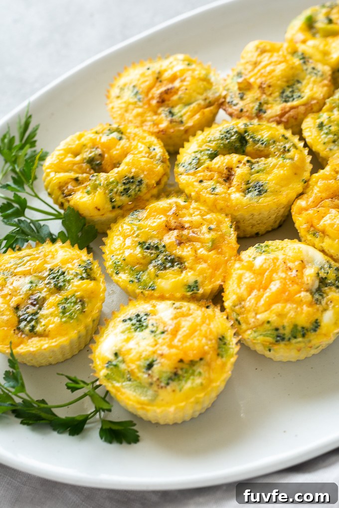 Crustless mini quiche on a platter with parsley