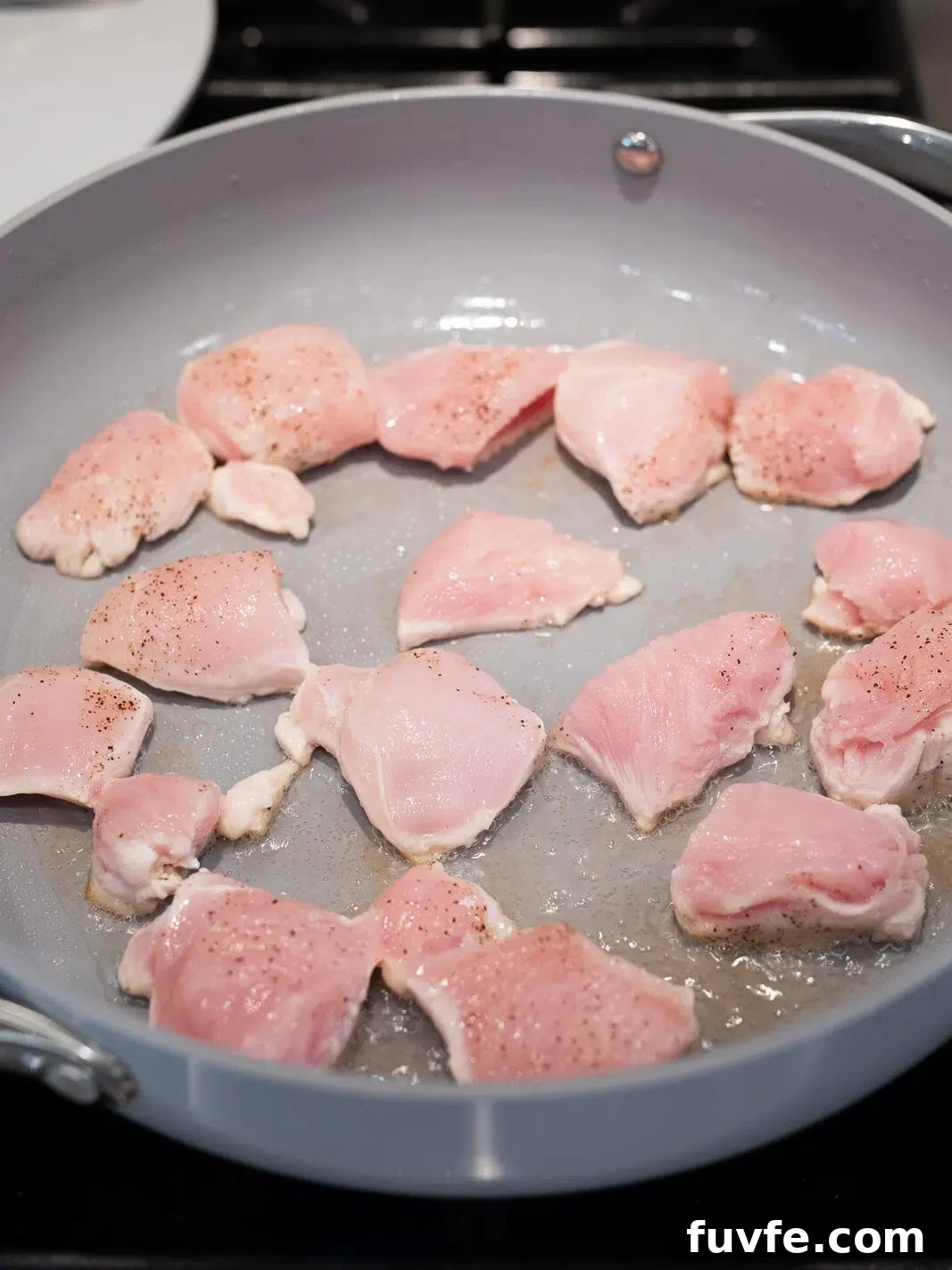 cooking chicken in a skillet