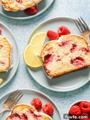 slices of raspberry lemon loaf on blue plates.