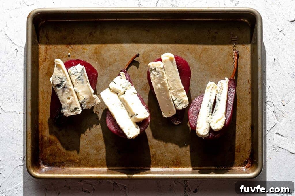 pears and blue cheese on baking sheet
