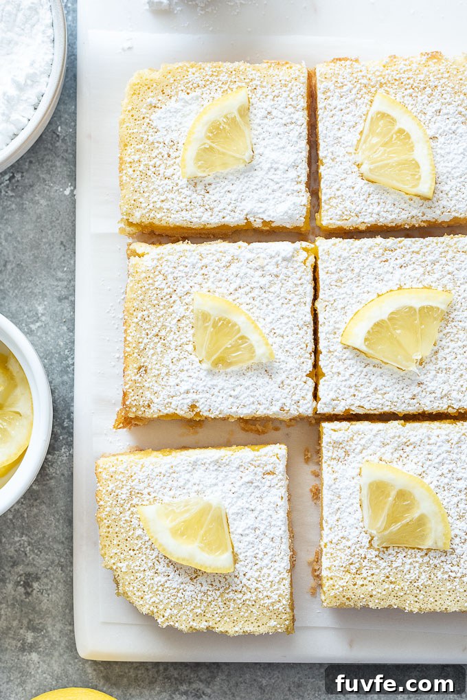 Lemon bars cut into squares on a platter