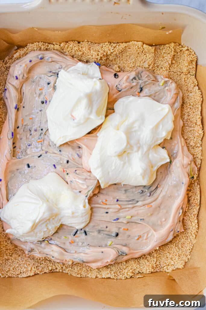 The cheesecake mixture is swirled together