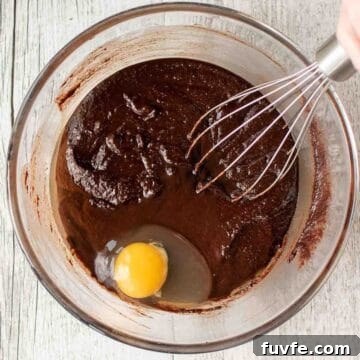 Egg on melted chocolate mixture.