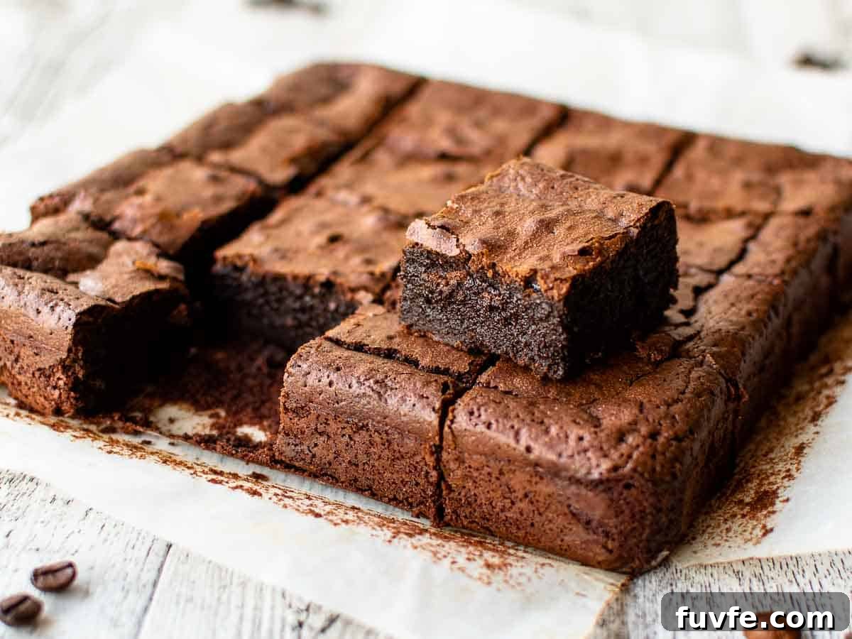 Brownies cut into squares with one removed and place on top of the others.