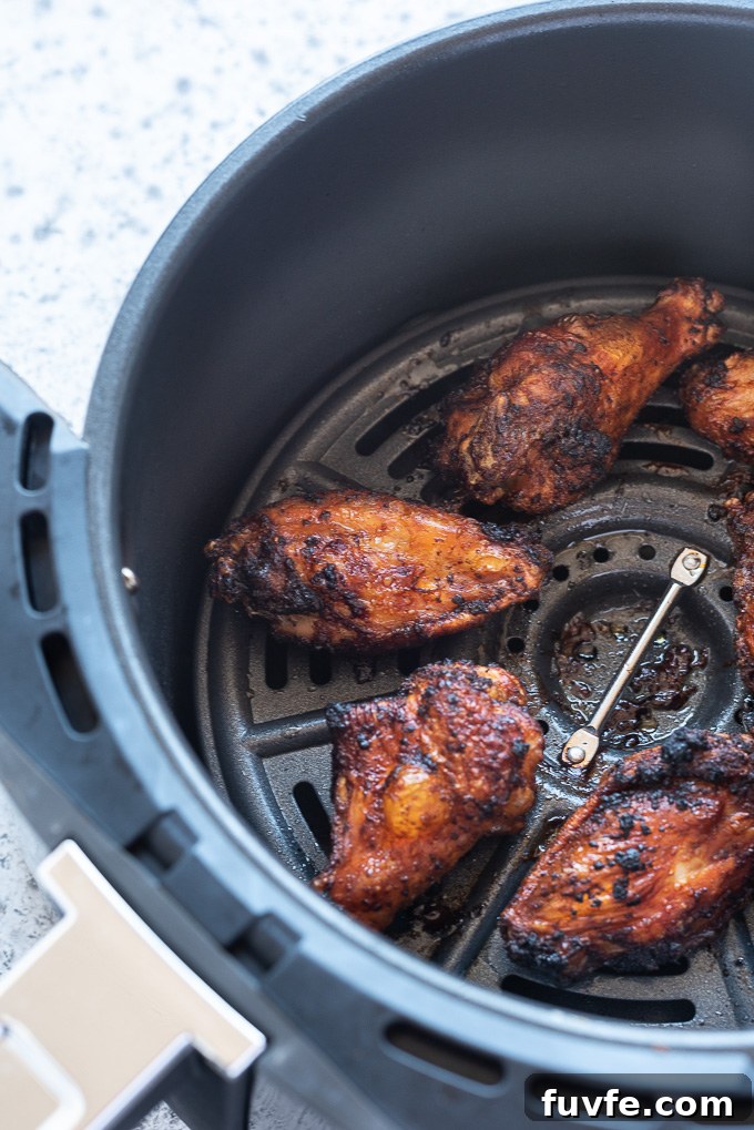How to Make Crispy Air Fryer Chicken Wings 7 Air fryer chicken wings in air fryer basket